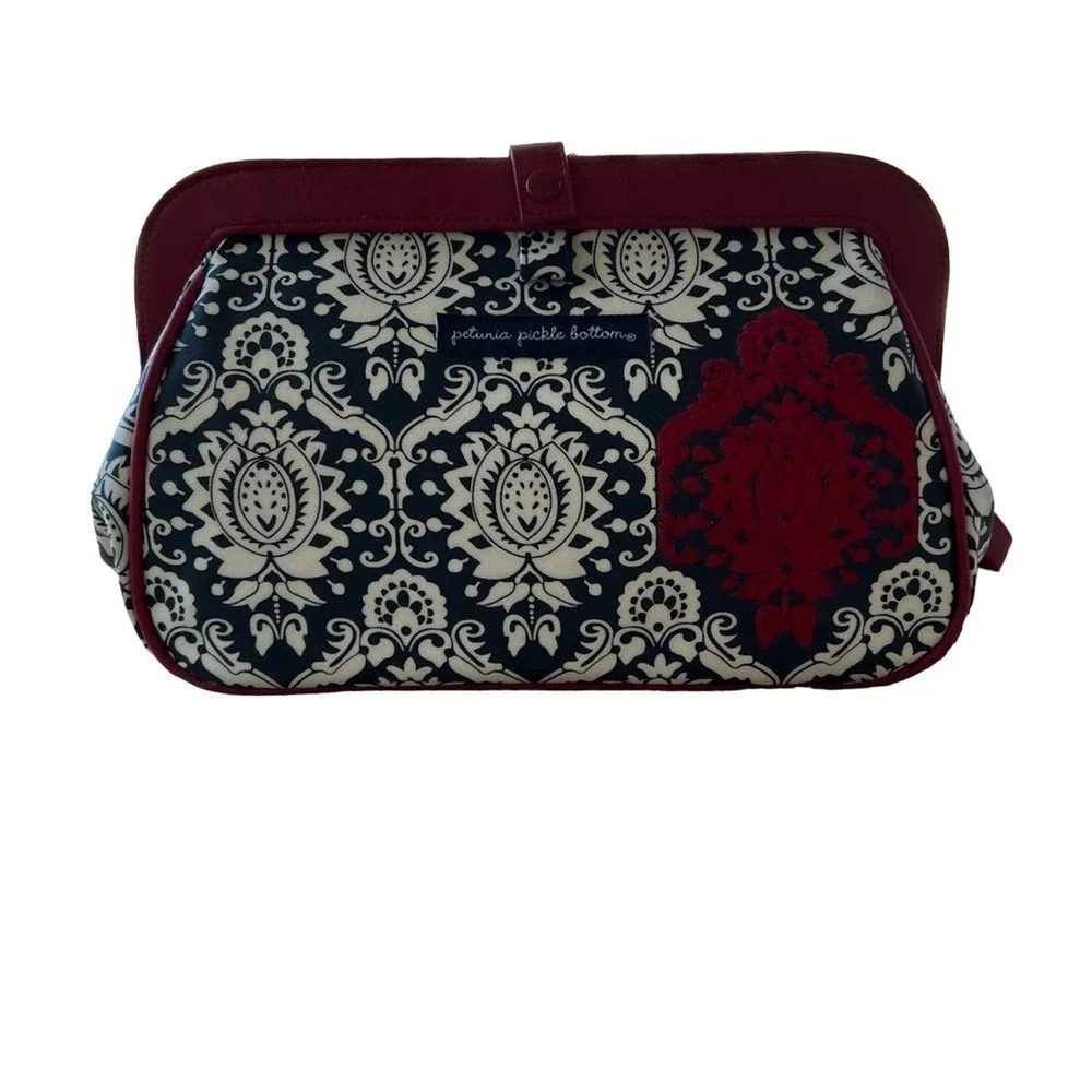 PETUNIA PICKLE BOTTOM red and black diaper changing clutch bag